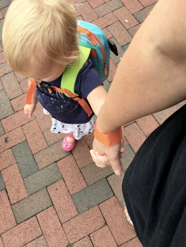 holding hands with baby leash